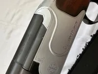 Huglo 103DE kaliber 12/76, serie nummer: OZS1558 som ny