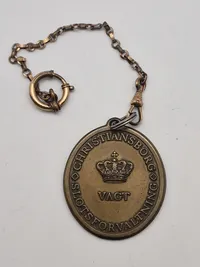 Originalt slotsvagt skilt