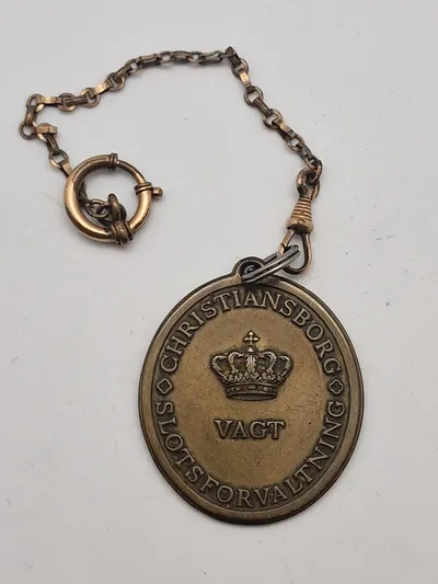 Originalt slotsvagt skilt