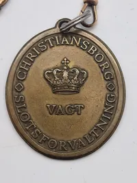 Originalt slotsvagt skilt