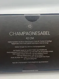 Uåbnet champagne sabel