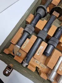 US WW2 Army  Gun bore sight kit
An original US WW2 all complete, Gun bore sight kit, for .50/22mm/35mm type arms, complete  wooden case 1944 dated.