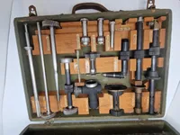 US WW2 Army  Gun bore sight kit
An original US WW2 all complete, Gun bore sight kit, for .50/22mm/35mm type arms, complete  wooden case 1944 dated.