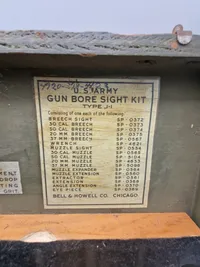 US WW2 Army  Gun bore sight kit
An original US WW2 all complete, Gun bore sight kit, for .50/22mm/35mm type arms, complete  wooden case 1944 dated.