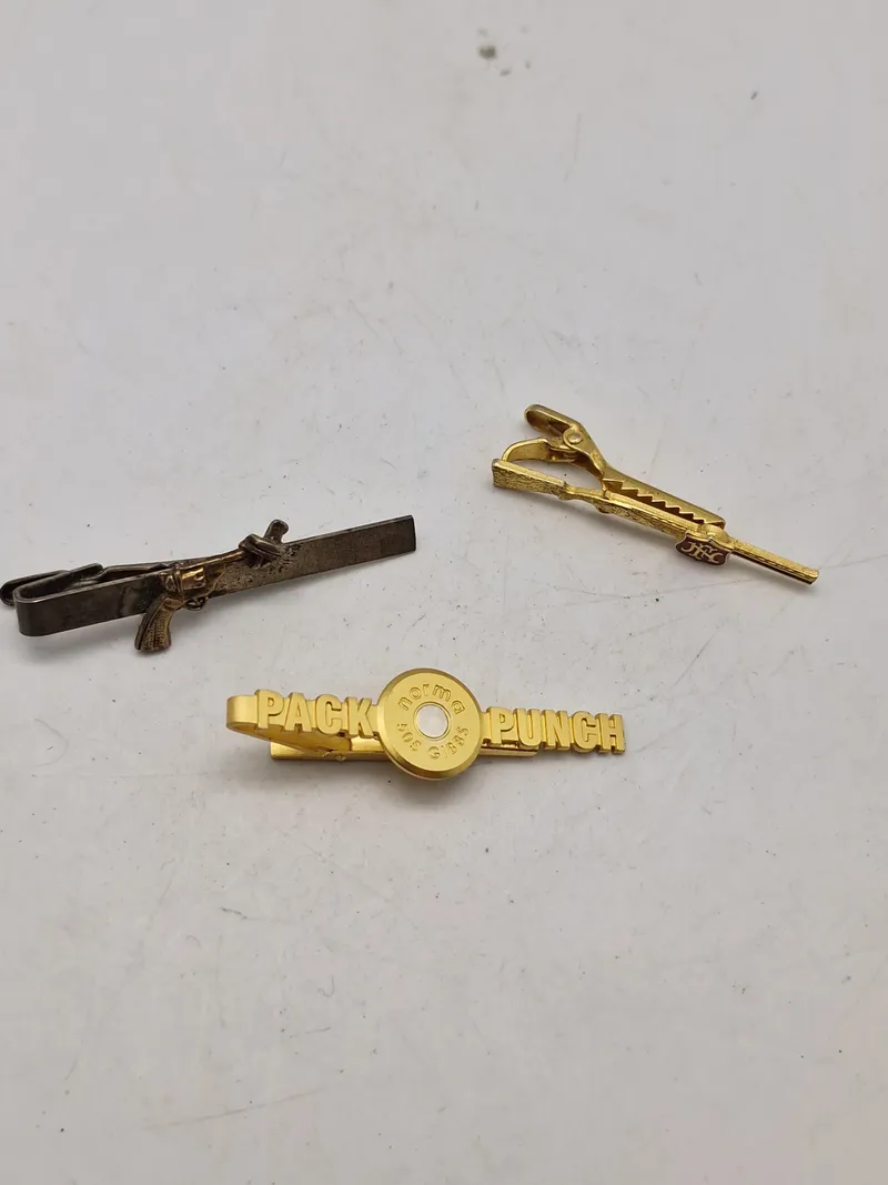 Slipsenåle våben og ammunition