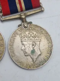 Original Elgelsk WW1 og WW2 medalje spange, navngiven