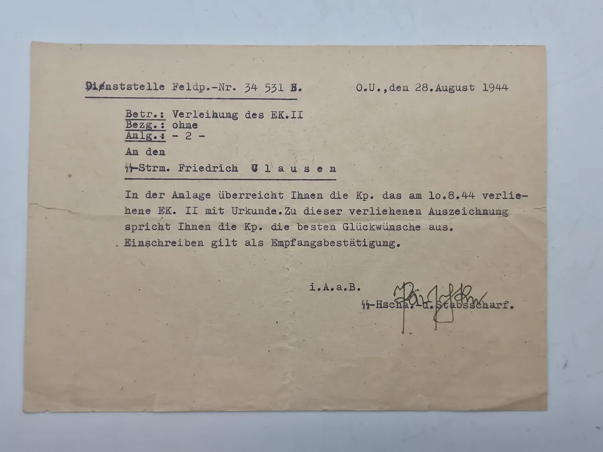 Original Meddelelse om tildeling af Jernkorset 2 klasse til Dansk Frivillig