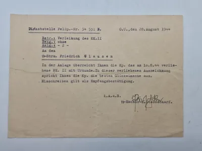 Original Meddelelse om tildeling af Jernkorset 2 klasse til Dansk Frivillig