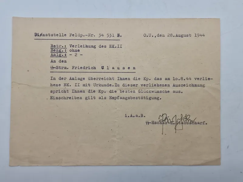 Original Meddelelse om tildeling af Jernkorset 2 klasse til Dansk Frivillig