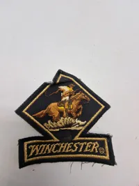 Samling patches med våben og ammunition