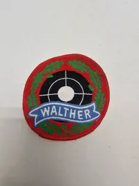 Samling patches med våben og ammunition