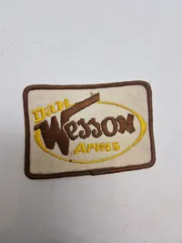 Samling patches med våben og ammunition