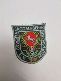 Samling patches med våben og ammunition
