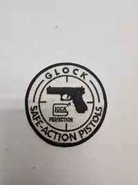 Samling patches med våben og ammunition