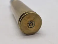 Samfundshjælper lavet af 20 mm patron, til minde om soldatertiden