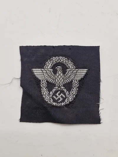 Originalt Polizei cap wool badge - ubrugt