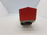 Modelbil med æske