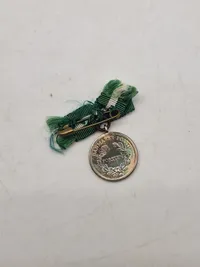 Original fortjenstmedalje (stor og miniature) sølv  fra det danske politi - givet til kvinde