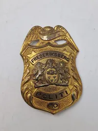 To originale skilte fra samme politibetjent, det ene er fra speciel uddannelse i USA før ww2