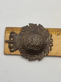 Originalt M/23 hjelmmærke