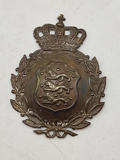 Originalt M/23 hjelmmærke