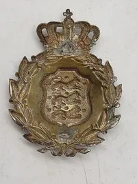 Originalt M/23 hjelmmærke