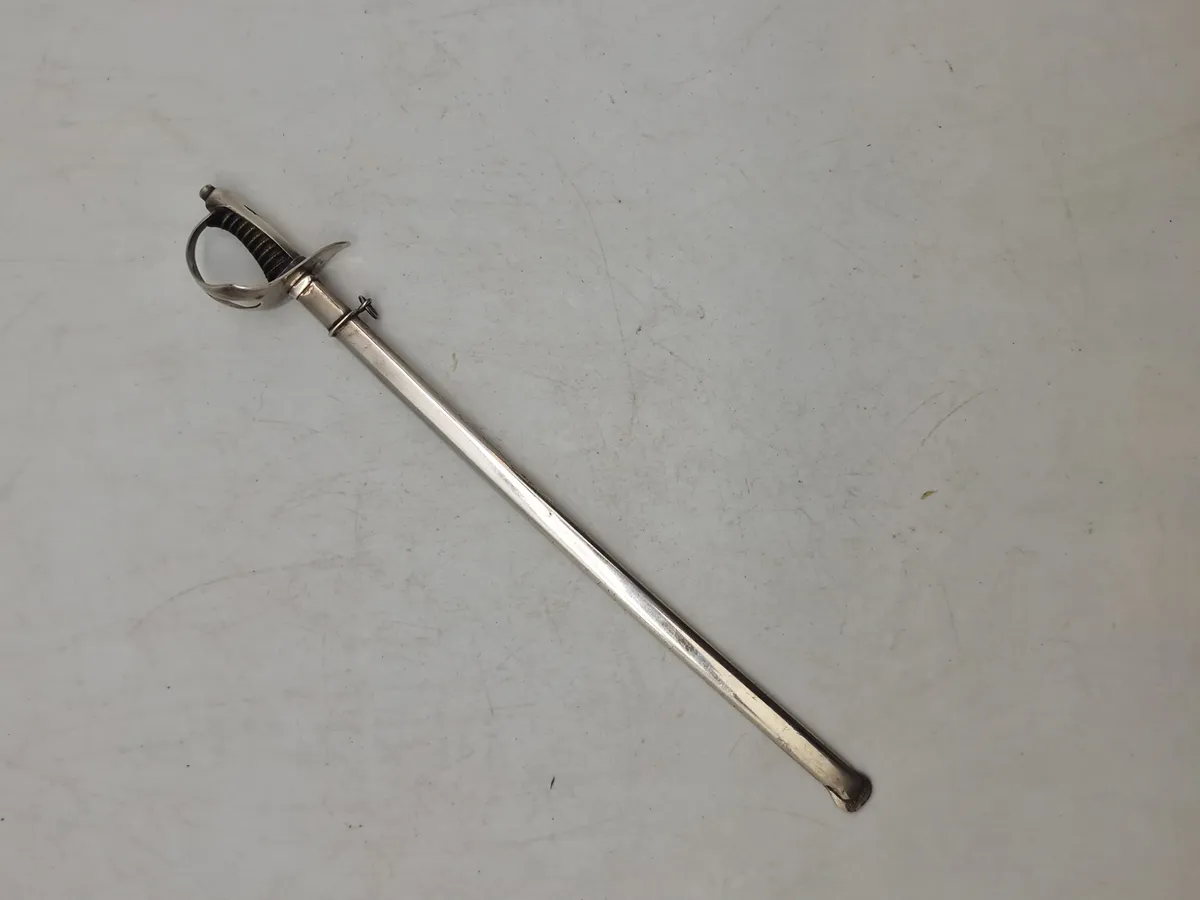 Veludført miniature sabel af sterlingsølv