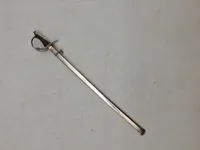 Veludført miniature sabel af sterlingsølv