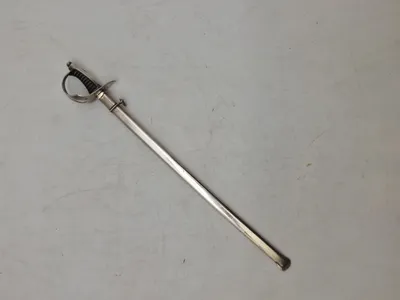 Veludført miniature sabel af sterlingsølv