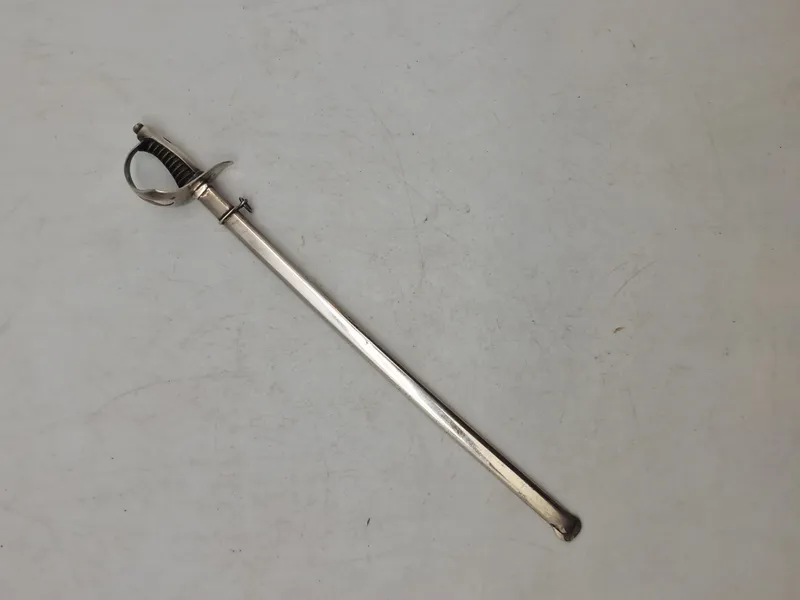 Veludført miniature sabel af sterlingsølv