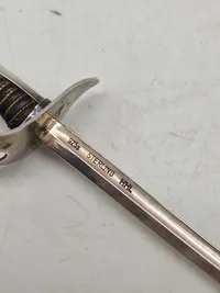 Veludført miniature sabel af sterlingsølv
