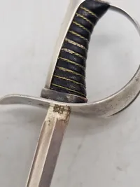 Veludført miniature sabel af sterlingsølv