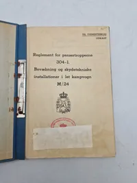 Reglement for pansertropperne

304-1.

Bevæbning og skydetekniske.

installationer i let kampvogn M/24