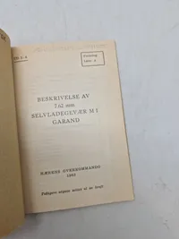 BESKRIVELSE AV

7.62 mm

SELVLADEGEVÆR M1 GARAND

HERENS OVERKOMMANDO 1963