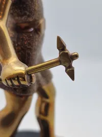 Antik figur forstillende Thor på høj fod