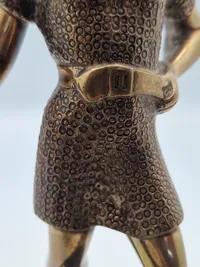 Antik figur forstillende Thor på høj fod