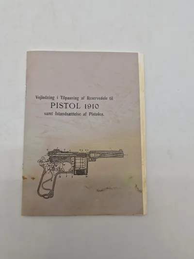 Vejledning i Tilpasning af Reservedele til PISTOL 1910 samt Istandsættelse af Pistolen