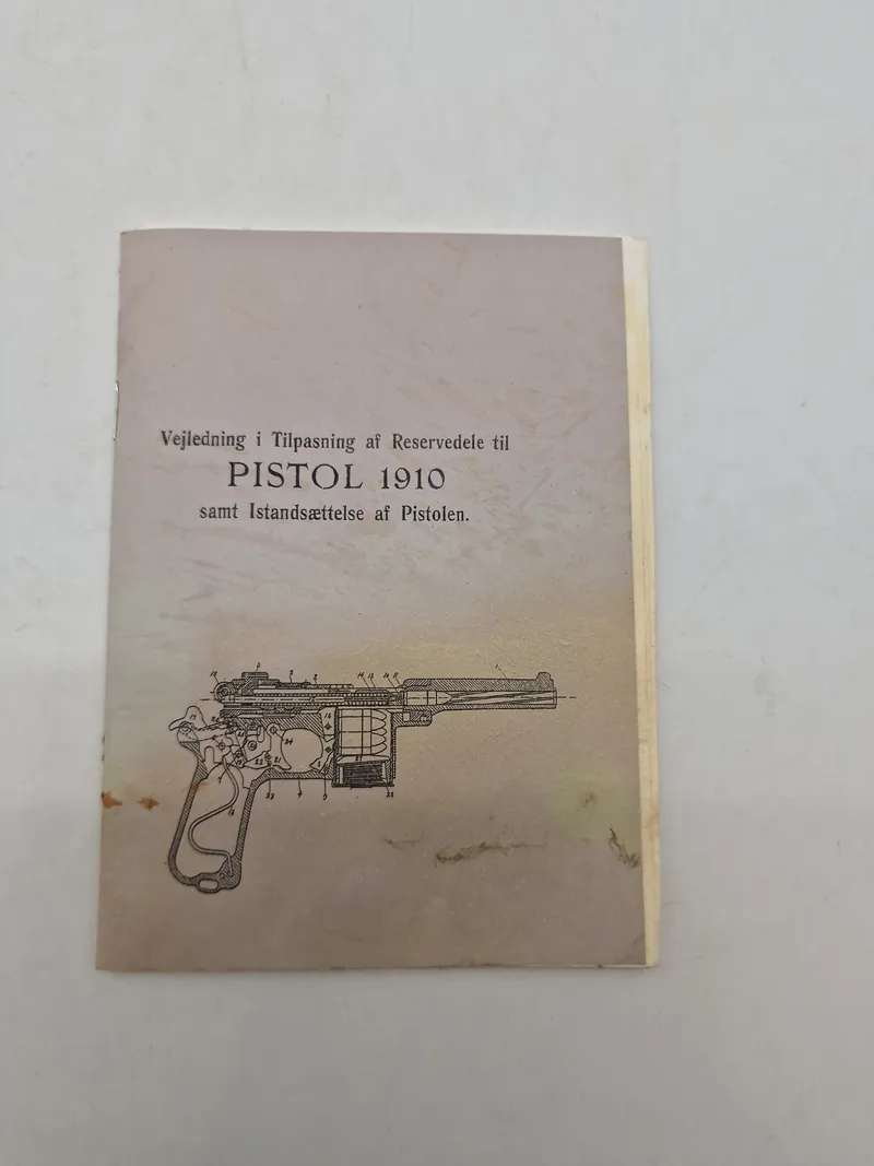 Vejledning i Tilpasning af Reservedele til PISTOL 1910 samt Istandsættelse af Pistolen