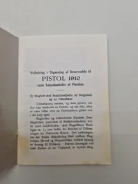 Vejledning i Tilpasning af Reservedele til PISTOL 1910 samt Istandsættelse af Pistolen