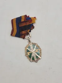 Orignal bl.a. medalje fra føringsstøtteelementet