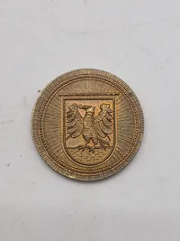 Orignal bl.a. medalje fra føringsstøtteelementet