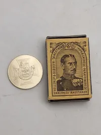 Engelsk mønt med motiv af The Victoria Cross