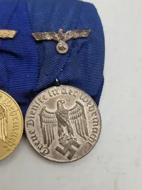 Original spange “Für Treue Dienst in der Wehrmacht” 4 og 12 år