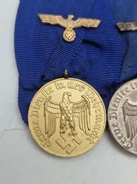 Original spange “Für Treue Dienst in der Wehrmacht” 4 og 12 år