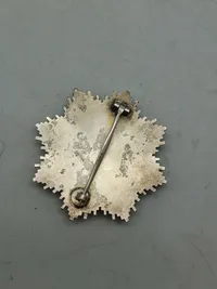 deutsches kreuz in gold (DKiG) lavet hos Rudolf Souval lige efter krigen. Fremstillet på originale maskiner, og delvist originale dele/materialer. Lavet som souvenir til amerikanske tropper