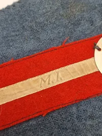 Originalt dansk “MI” armbind fra modstandsbevægelsen