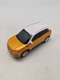 Modelbil med æske