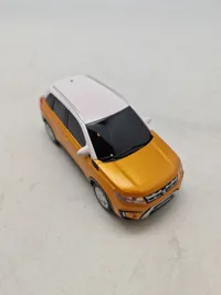 Modelbil med æske