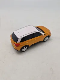 Modelbil med æske