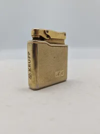 Original lighter med reklame for Krupp